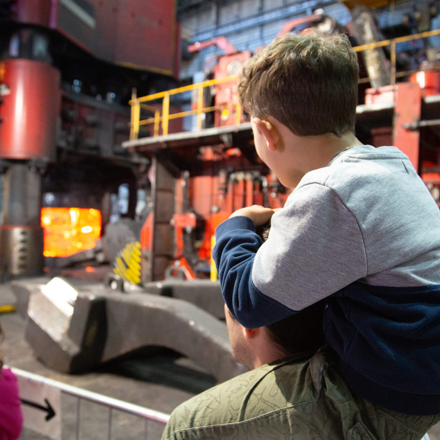 Parents with child at work
